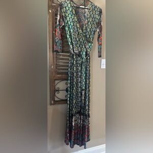 Tua Maxi Dress
Multi Color